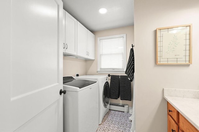clothes washing area with cabinet space, recessed lighting, a baseboard heating unit, and washer and clothes dryer