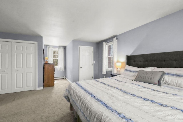 bedroom featuring baseboards, carpet, and a baseboard radiator