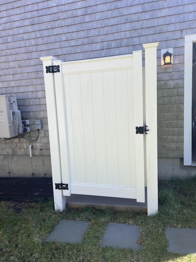 view of gate with ac unit