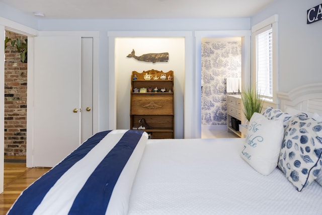 bedroom with light wood-type flooring