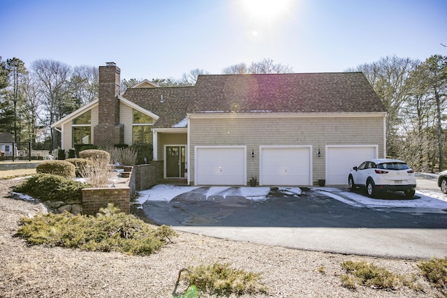 view of front of home with a garage