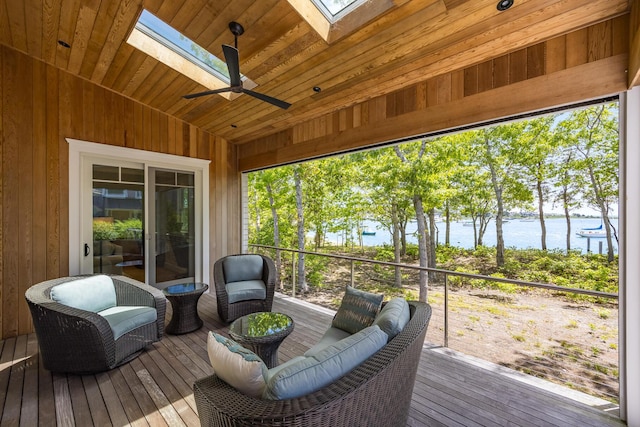2 Bridge St, East Falmouth, MA 02536 - sunroom / solarium featuring a skylight, a water view, vaulted ceiling, and a ceiling fan