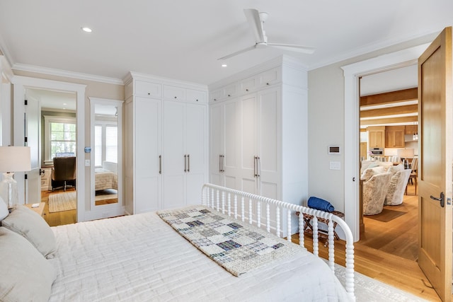 2 Bridge St, East Falmouth, MA 02536 - bedroom with light wood finished floors, crown molding, recessed lighting, and ceiling fan