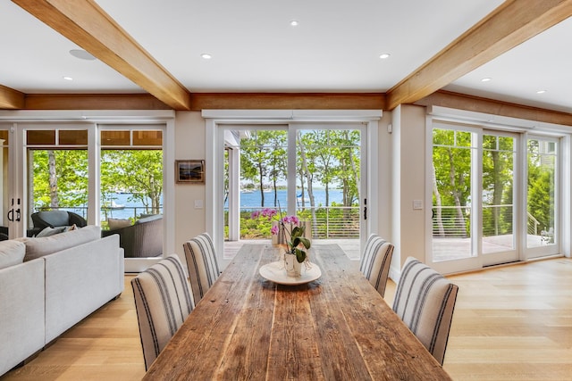2 Bridge St, East Falmouth, MA 02536 - dining room featuring beamed ceiling, a water view, light wood-style flooring, and recessed lighting