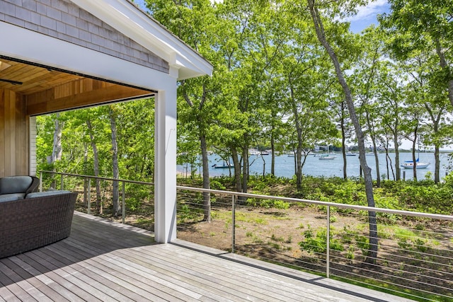 2 Bridge St, East Falmouth, MA 02536 - deck with a water view and view of wooded area