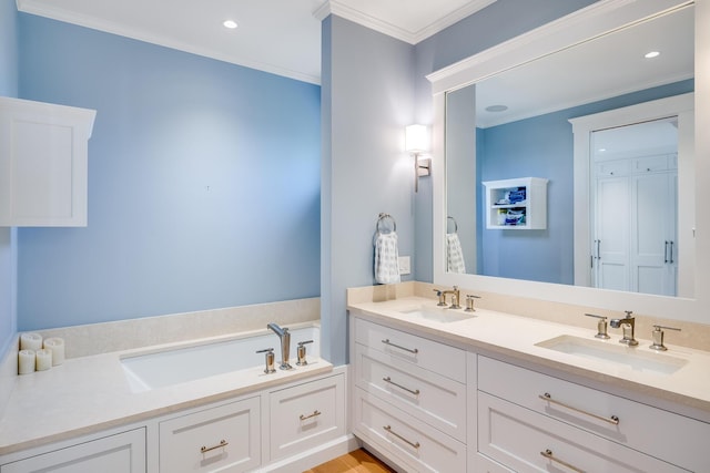 2 Bridge St, East Falmouth, MA 02536 - bathroom featuring double vanity, ornamental molding, recessed lighting, and a bath