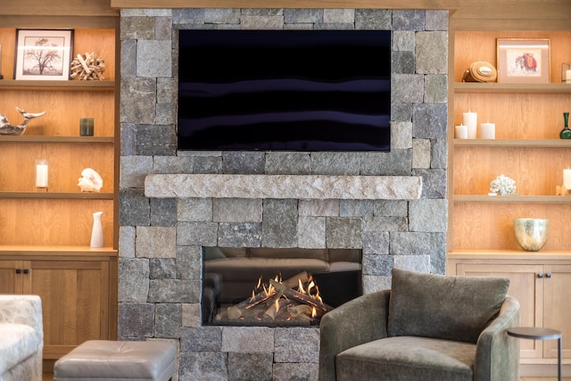 2 Bridge St, East Falmouth, MA 02536 - detailed view of a stone fireplace and built in shelves