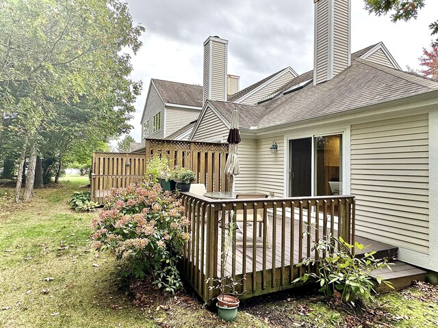 rear view of house with a deck