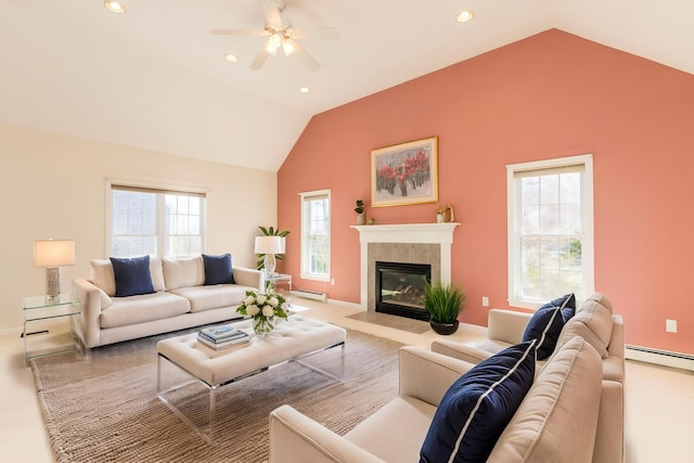living area with baseboards, ceiling fan, a fireplace, recessed lighting, and lofted ceiling