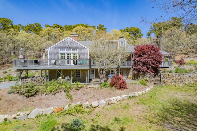 55 Winterset Dr, Chatham, MA 02633 - rear view of house featuring a deck and a chimney