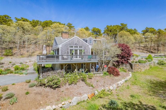55 Winterset Dr, Chatham, MA 02633 - back of house with a wooden deck and a chimney