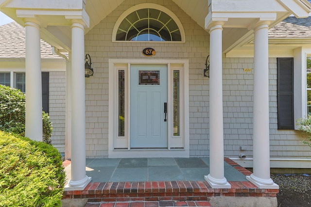 67 Sea Meadow Cir, Centerville, MA 02632 - entrance to property with a shingled roof