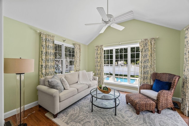 67 Sea Meadow Cir, Centerville, MA 02632 - living area with wood finished floors, ceiling fan, and vaulted ceiling