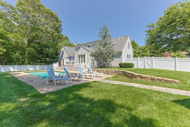 67 Sea Meadow Cir, Centerville, MA 02632 - back of house with a patio, a fenced backyard, and a gate