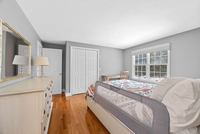 67 Sea Meadow Cir, Centerville, MA 02632 - bedroom with light wood-style floors and a closet