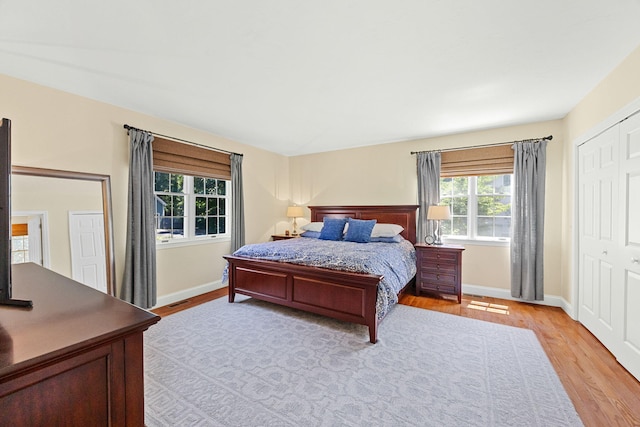 67 Sea Meadow Cir, Centerville, MA 02632 - bedroom featuring light wood-type flooring and baseboards