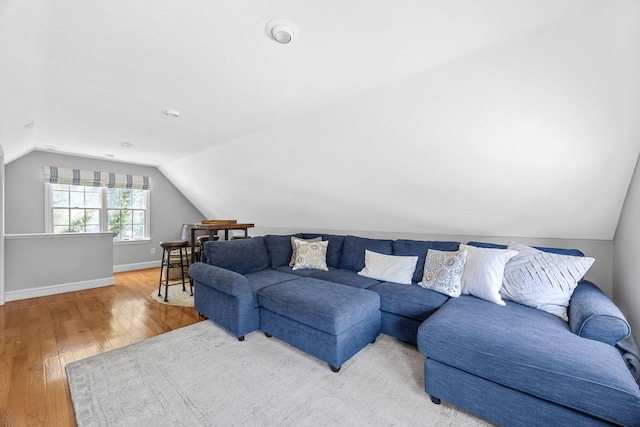 67 Sea Meadow Cir, Centerville, MA 02632 - living room with lofted ceiling and light wood-style floors