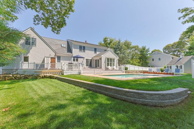 67 Sea Meadow Cir, Centerville, MA 02632 - rear view of property with a deck, a fenced backyard, and a patio area