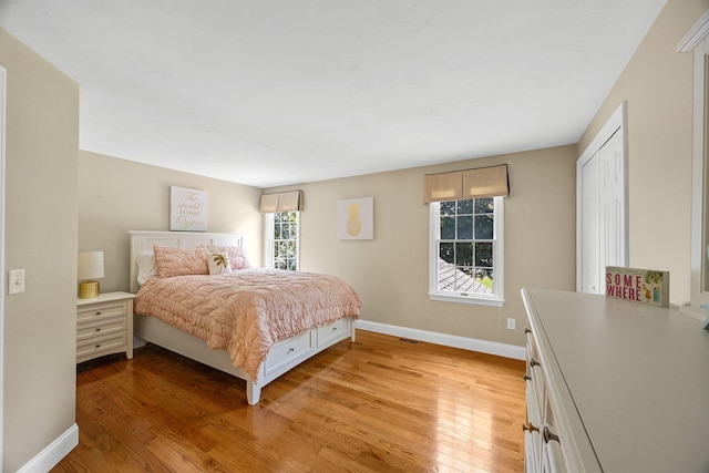 67 Sea Meadow Cir, Centerville, MA 02632 - bedroom featuring light wood-style flooring