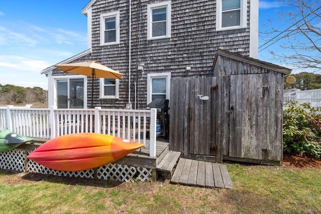 back of property with a deck