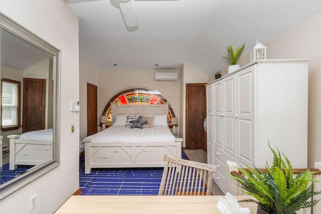 bedroom featuring ceiling fan and a wall mounted air conditioner