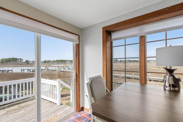 dining area featuring a water view