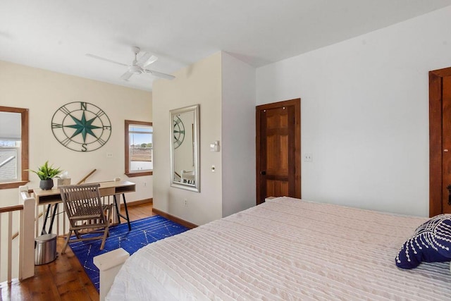 bedroom with wood finished floors