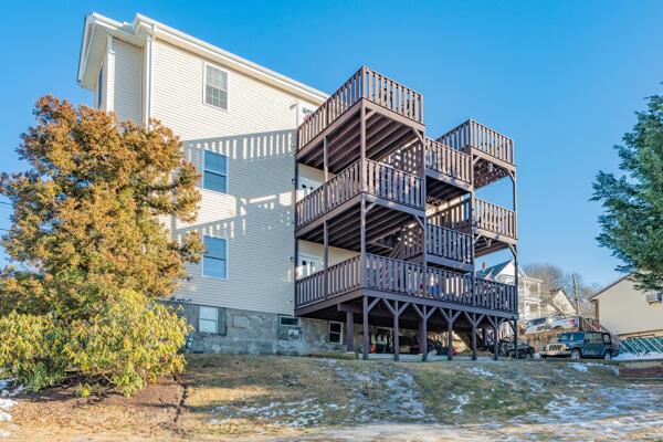 131 Stewart St Unit 2B, Fall River, MA 02720 - rear view of property featuring a balcony and a deck