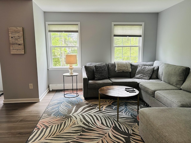 50 Great Hill Rd, Sandwich, MA 02563 - living room with wood finished floors, a baseboard heating unit, and baseboards