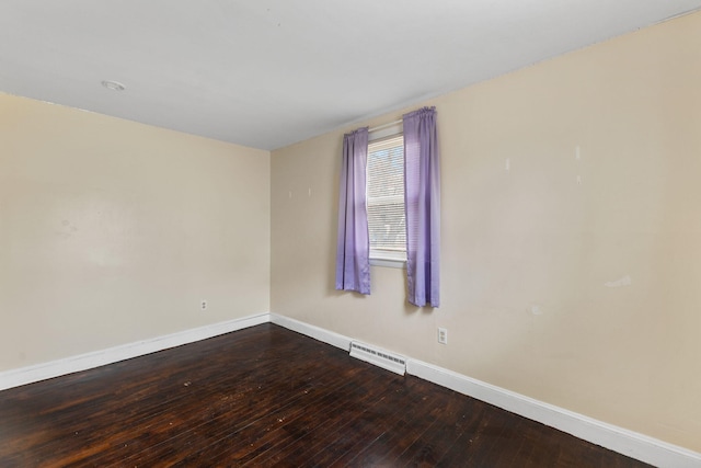 74 Fearing St, Buzzards Bay, MA 02532 - spare room with baseboards and wood-type flooring