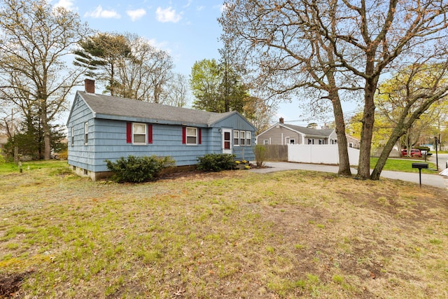 74 Fearing St, Buzzards Bay, MA 02532 - single story home with a chimney and roof with shingles