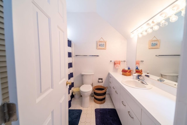 full bathroom with lofted ceiling, curtained shower, vanity, and toilet