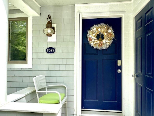 entrance to property featuring a garage