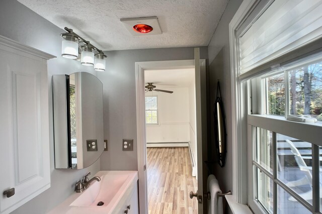 bedroom featuring light wood-type flooring, ceiling fan, and access to outside