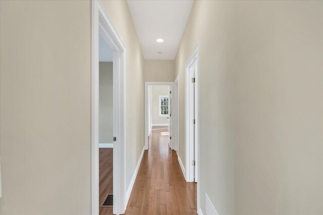 hall featuring hardwood / wood-style floors