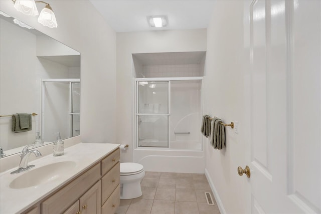 full bathroom with tile patterned floors, vanity, shower / bath combination with glass door, and toilet