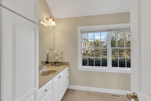 bathroom featuring tile patterned floors and vanity