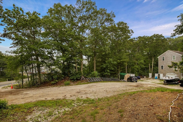 452 Nathan Ellis Hwy, Mashpee, MA 02649 - view of yard featuring dirt driveway