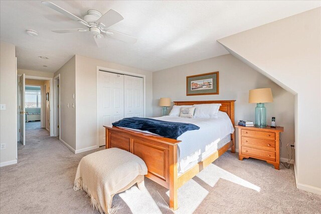 29 Highland Ter Unit 2903, Plymouth, MA 02360 - bedroom featuring light carpet, a closet, baseboards, and a ceiling fan