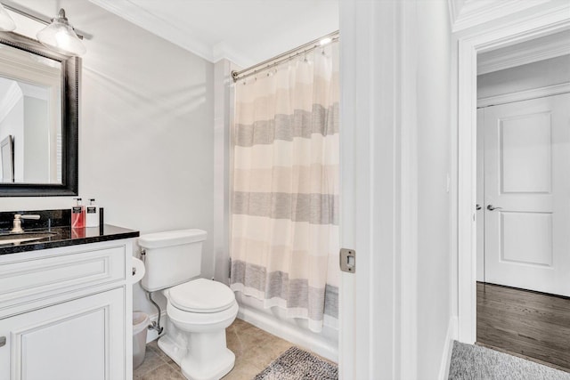 full bathroom featuring shower / bathtub combination with curtain, toilet, ornamental molding, vanity, and tile patterned floors