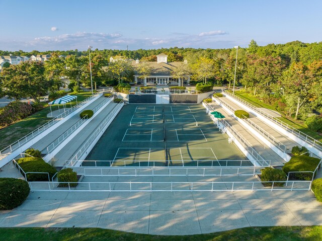 view of sport court with fence