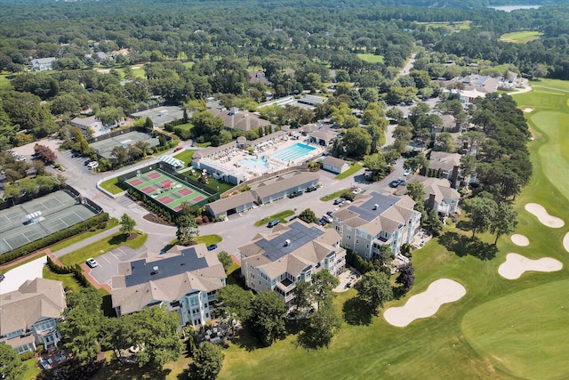 drone / aerial view featuring a residential view and golf course view