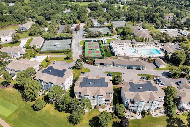 birds eye view of property with a residential view