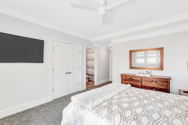 bedroom with crown molding, ensuite bathroom, carpet flooring, ceiling fan, and baseboards