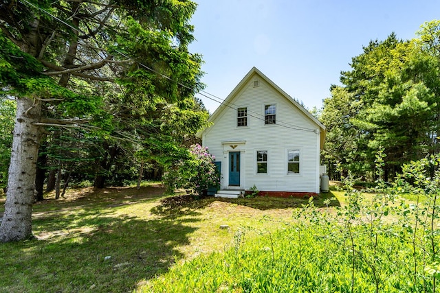 301 Main St, Dennis Port, MA 02639 - rear view of property featuring a yard and entry steps