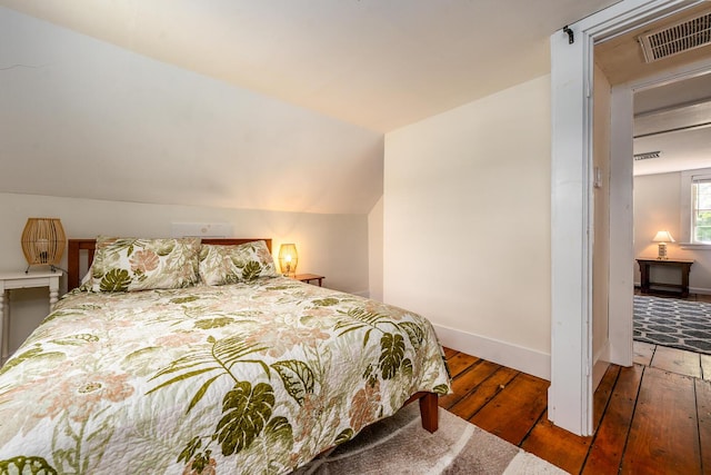 301 Main St, Dennis Port, MA 02639 - bedroom with hardwood / wood-style flooring and baseboards