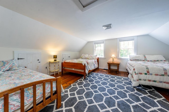 301 Main St, Dennis Port, MA 02639 - bedroom featuring wood finished floors and lofted ceiling