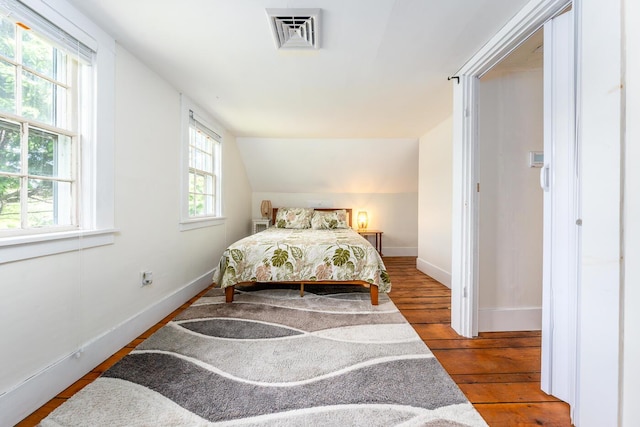 301 Main St, Dennis Port, MA 02639 - bedroom featuring wood finished floors, baseboards, and vaulted ceiling