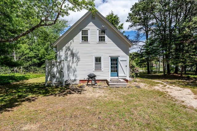 301 Main St, Dennis Port, MA 02639 - back of house with a lawn