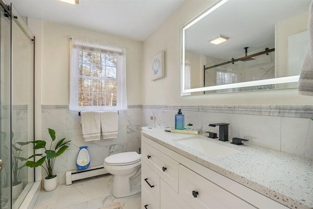 bathroom with a baseboard radiator, toilet, vanity, and walk in shower